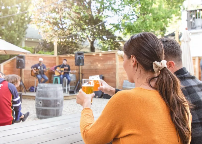 Guests enjoying live acoustic music on the corner stage