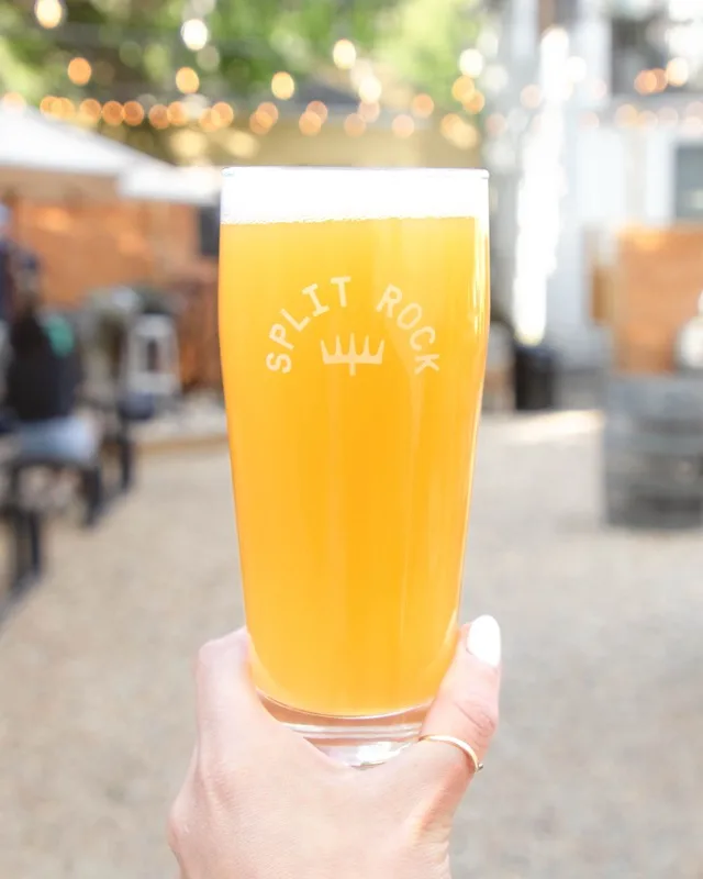Split Rock branded pint glass full of craft beer