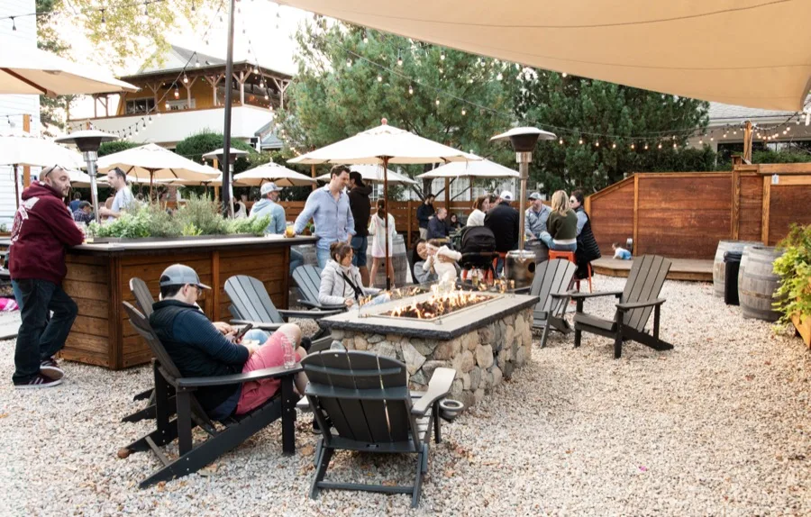Split Rock Scituate outdoor beer garden with adirondack chairs and fire pit